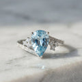 Butigini Silver Plated Anti Tarnish American Diamond Crushed Ice Cut Blue Teardrop Adjustable Finger Ring