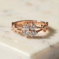 Butigini Rose Gold Plated American Diamond Studded Floral Motif Contemporary Adjustable Finger Ring