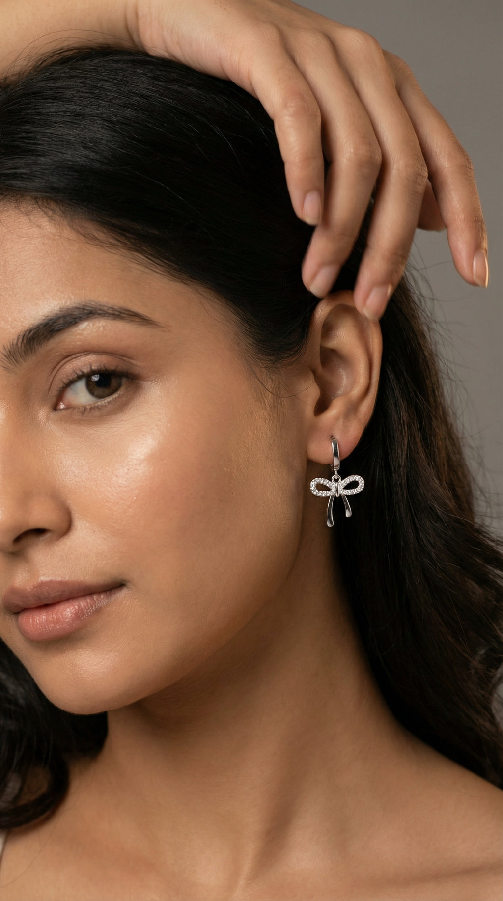 Butigini Silver Plated American Diamond Studded Bow Tie Korean Hoop Earrings