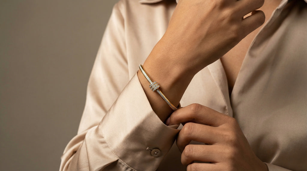 Butigini Gold Plated American Diamond Studded Barrel Charm Bangle Bracelet